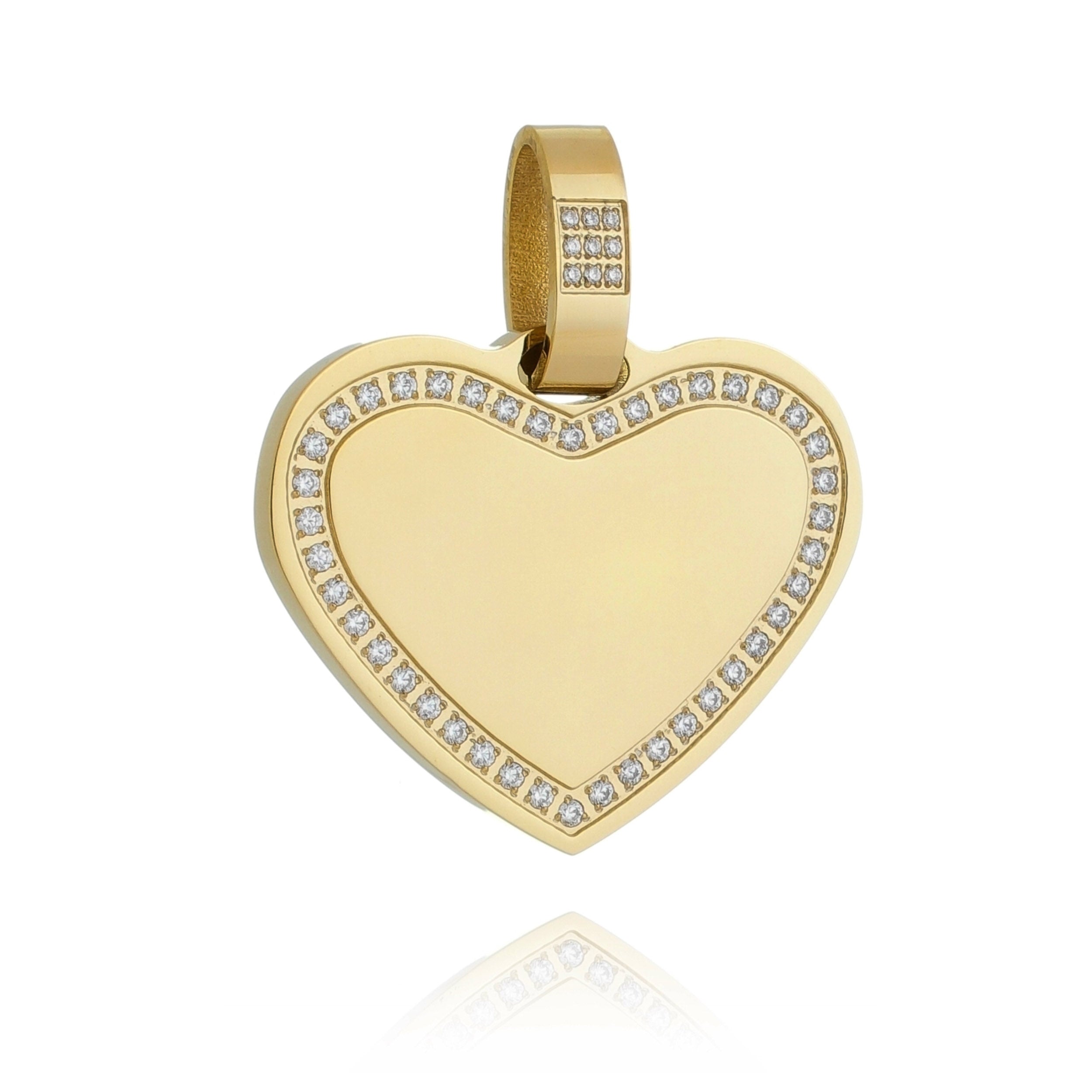 Colgante en forma de corazón con fotograbado y bordes con circonia.